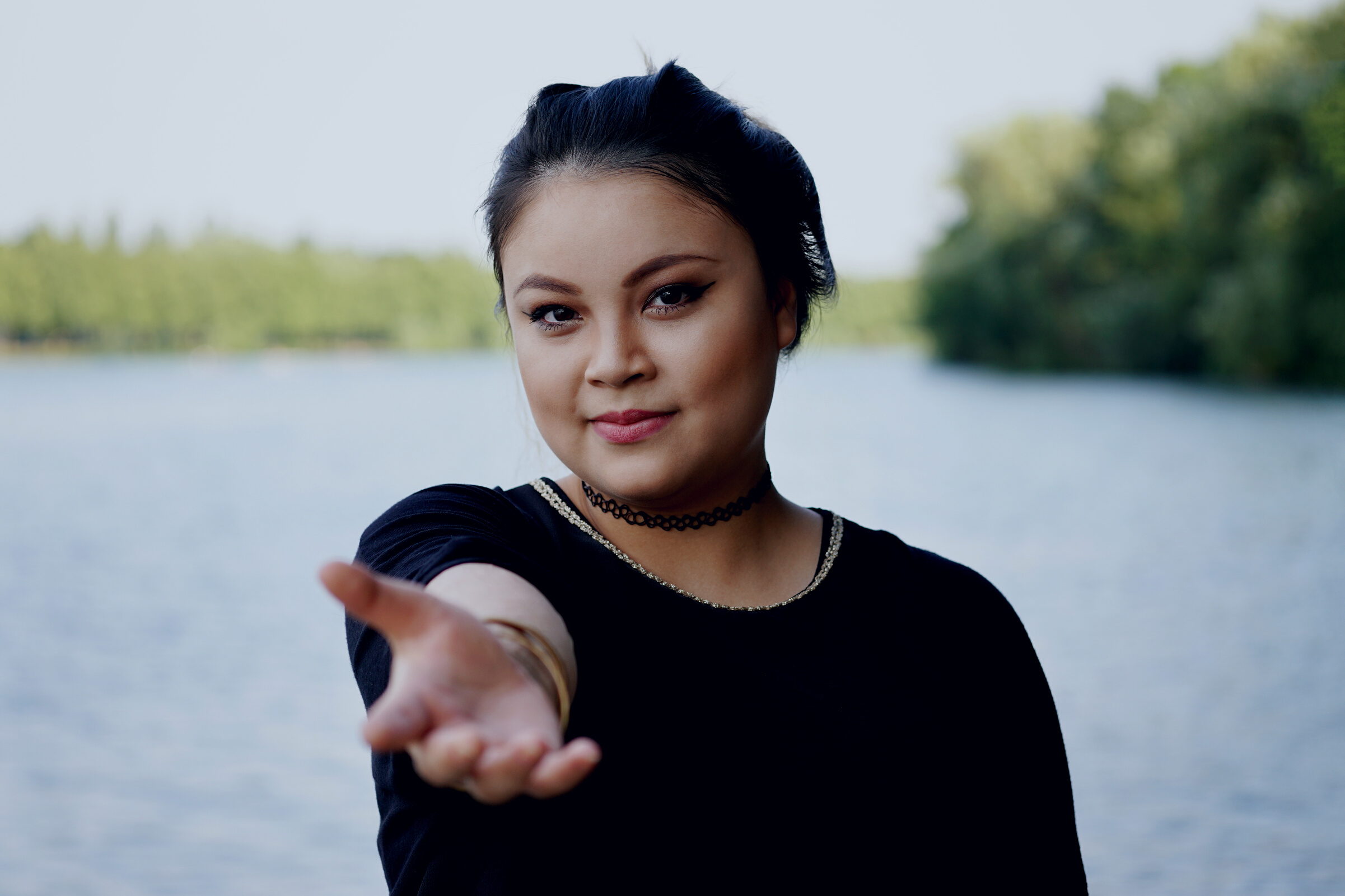 Asian Woman Reaching Out